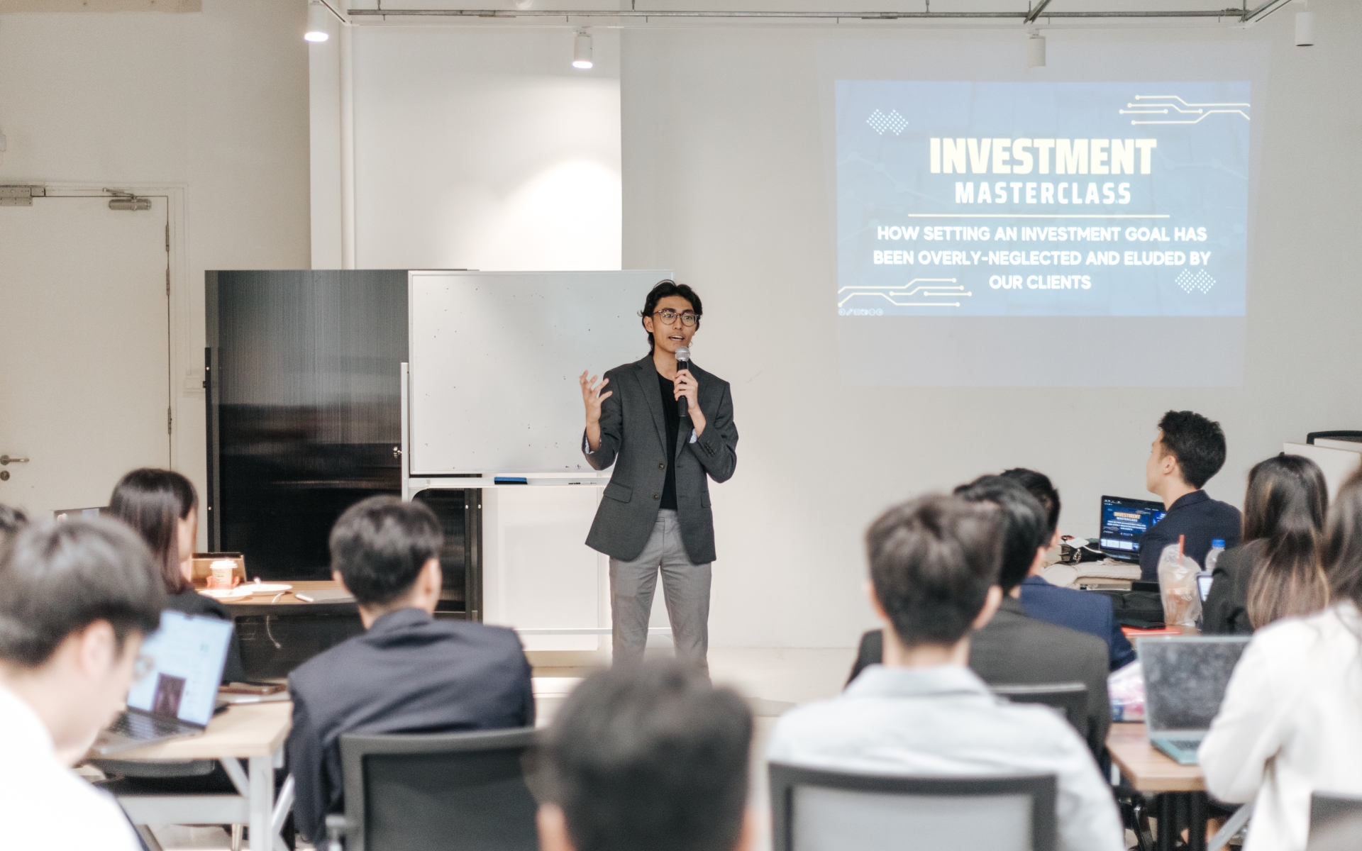 Basil Koh presenting at Investment Masterclass in Singapore — AIA Financial Advisers financial advisor